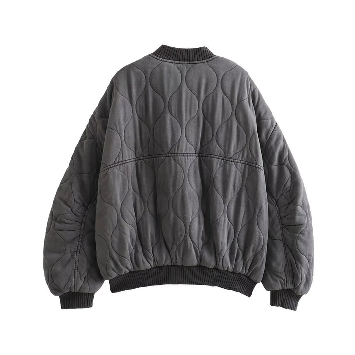 Chic women's oversized quilted bomber, a versatile layering piece for everyday fashion outerwear.