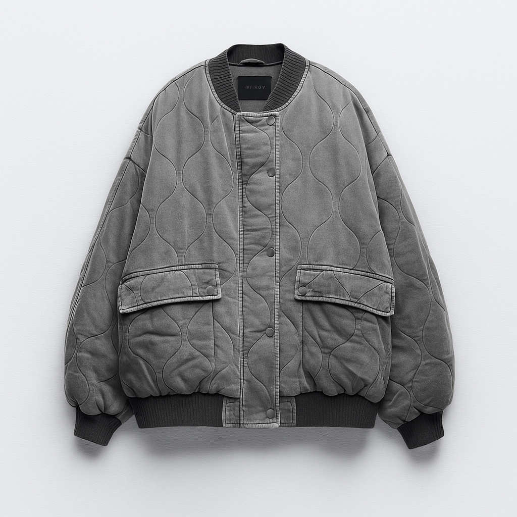 Women's oversized quilted bomber jacket for effortless casual style with utility pockets.