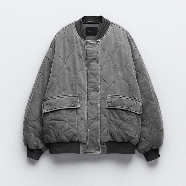 Women's oversized quilted bomber jacket for effortless casual style with utility pockets.
