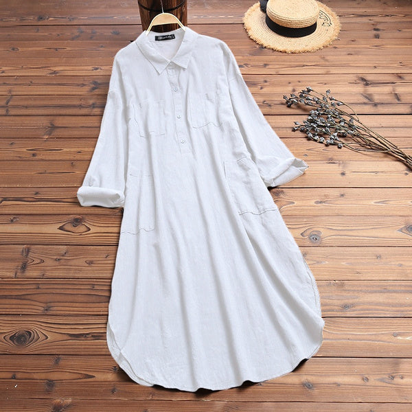 Versatile women's oversized shirt dress, functioning as a stylish maxi dress or a breezy beach coverup.
