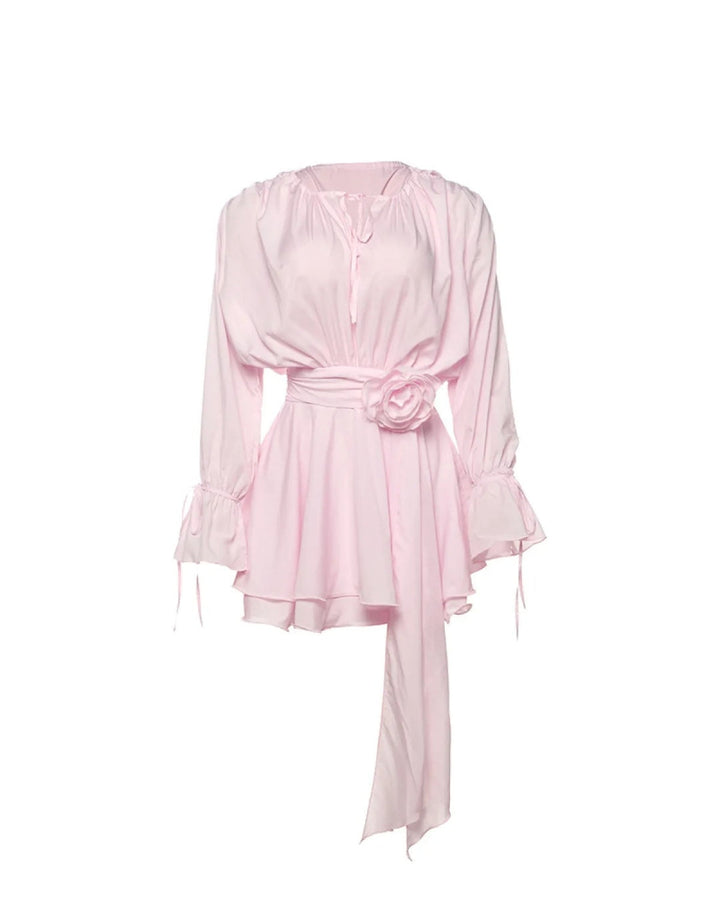 Sophisticated women's pink mini dress with long sleeves & a beautiful rose belt, a perfect choice for elegant gatherings.