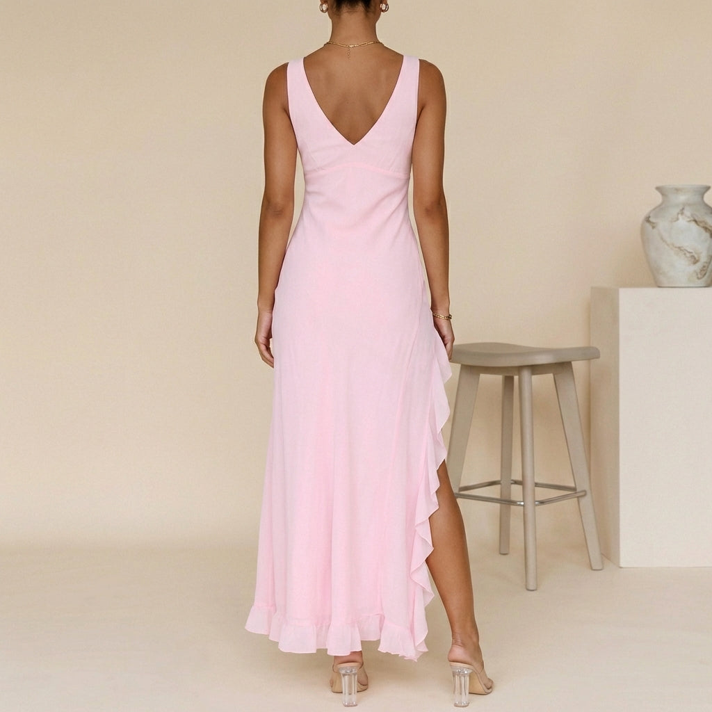 Women's formal pink maxi dress with V-neck, ruffles & slit. Ideal spring/summer party or wedding guest attire.
