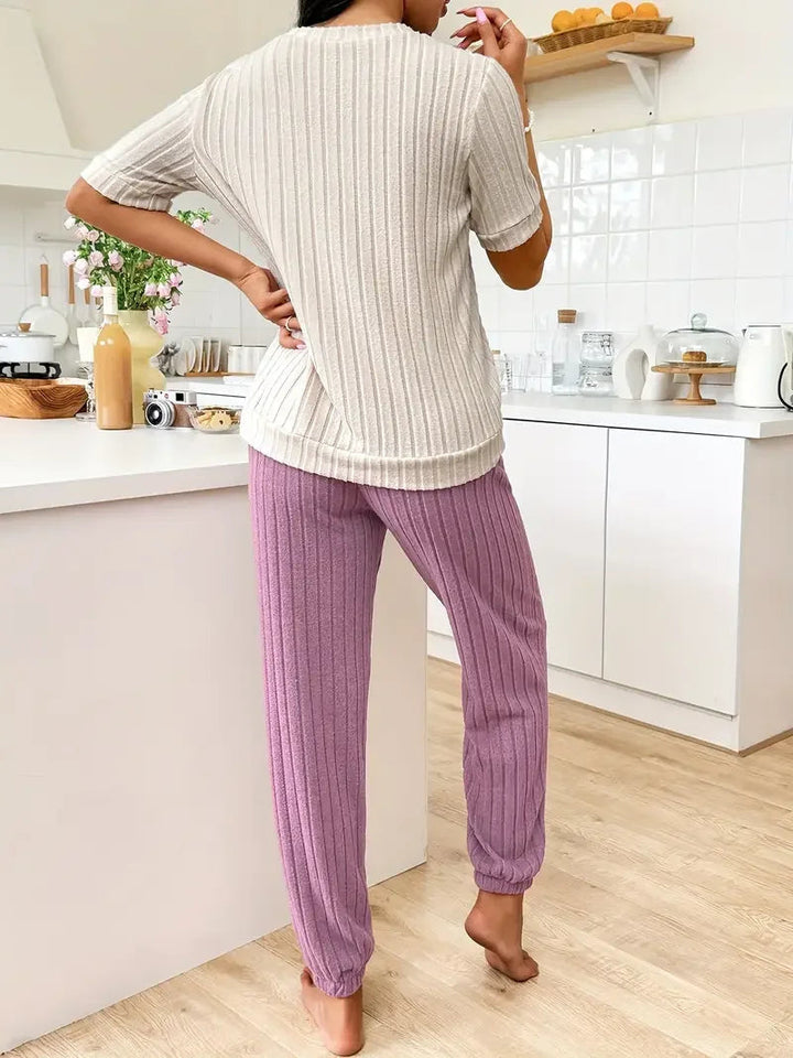 Ribbed women's pyjama set with cute heart print. Soft, comfy loungewear & nightwear.