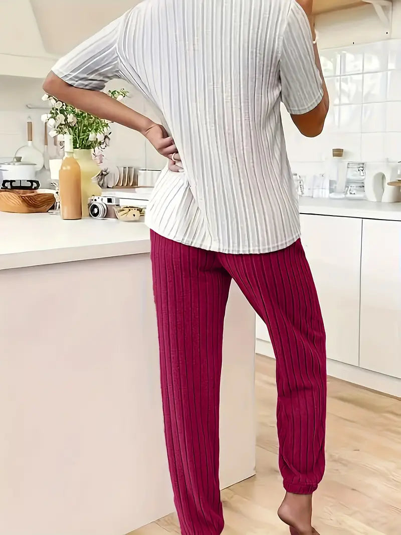Two-piece women's ribbed pyjama set featuring a sweet heart print. Comfy sleepwear & loungewear.