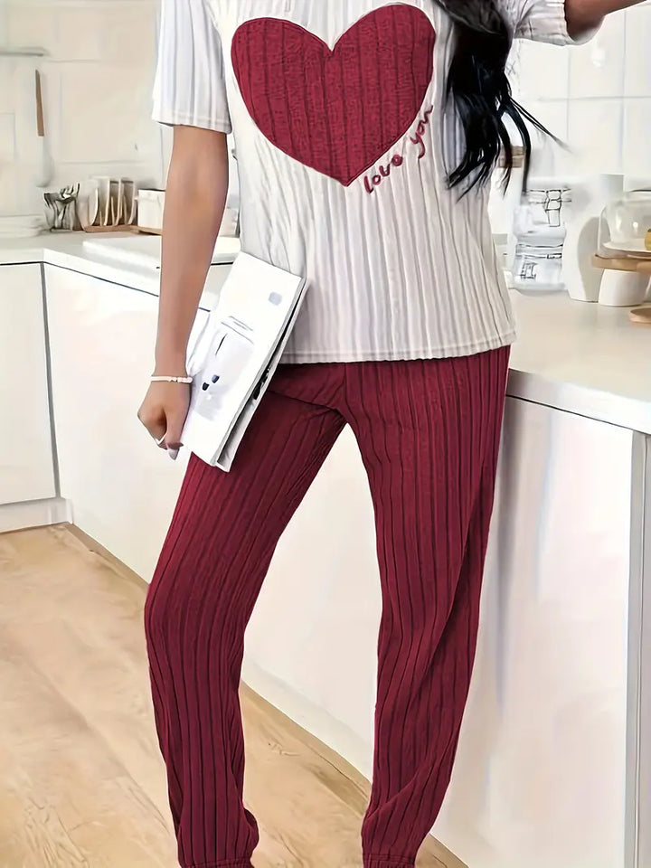 Women's cozy heart print ribbed pyjama set. Soft two-piece sleepwear and loungewear.