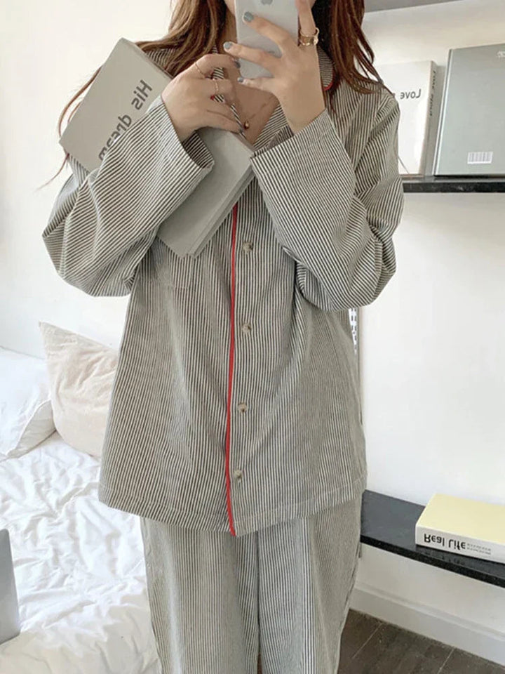 Light grey striped women's long sleeve pyjama set, a cozy two-piece sleepwear and loungewear outfit.