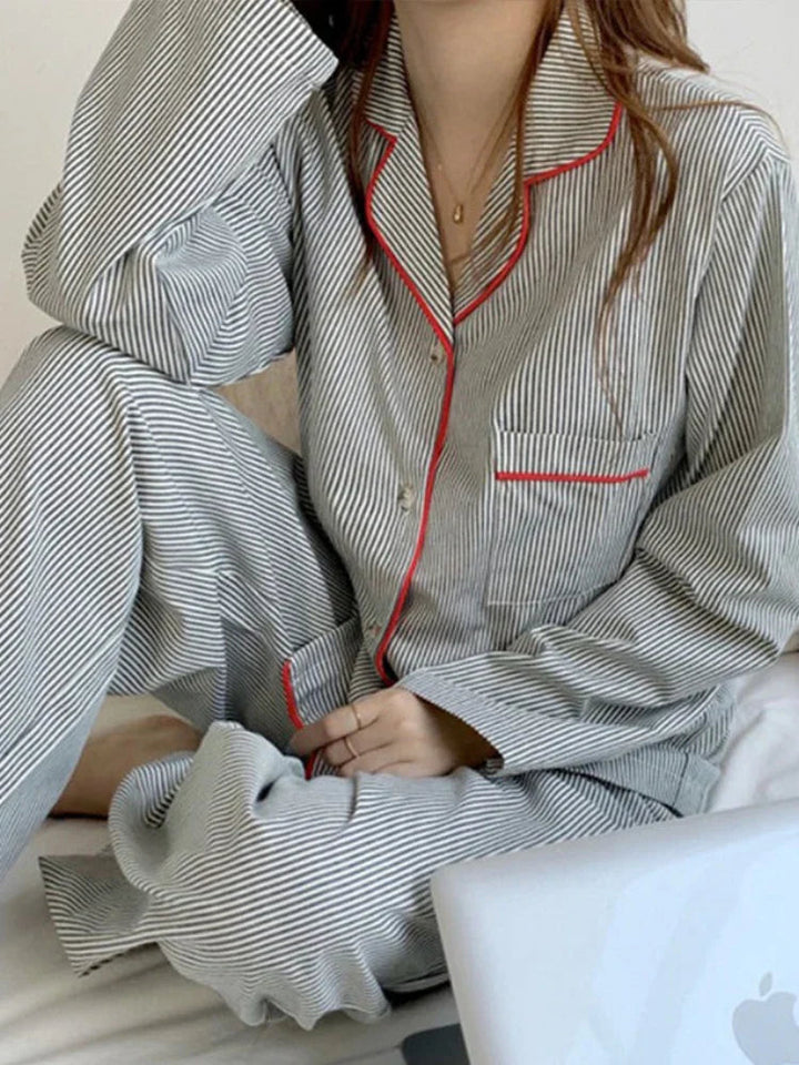Soft light grey striped women's long sleeve pyjamas, comfortable and stylish two-piece loungewear set.