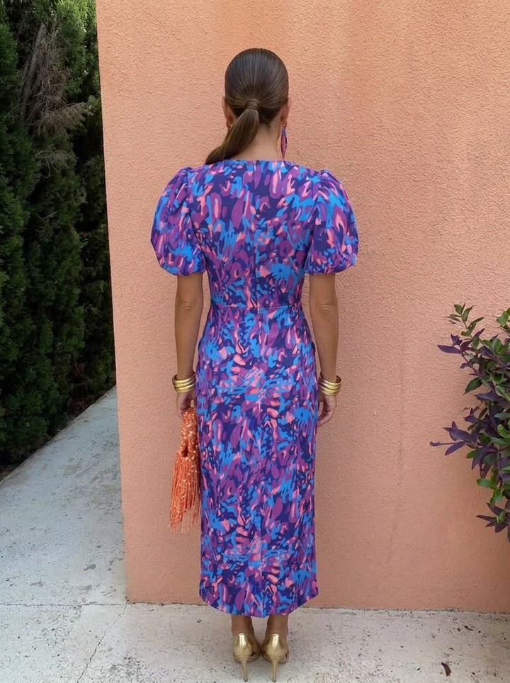 Spring/summer women's floral midi dress, elegant puff sleeves & V-neck, ideal for race day attire.