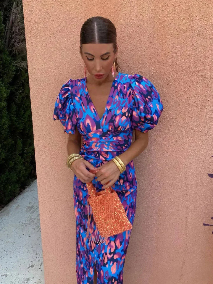 Elegant women's floral midi race dress with puff sleeves & V-neck, perfect for spring occasions.
