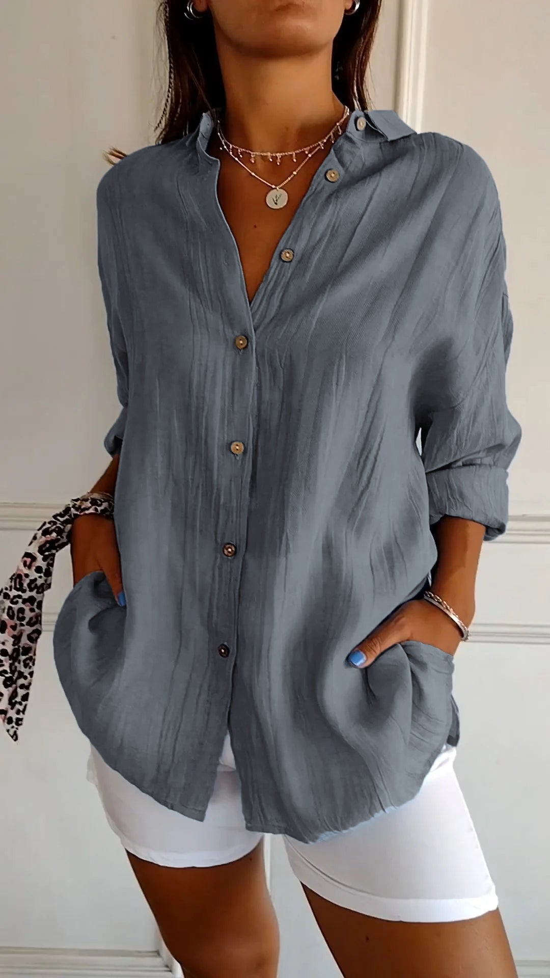 Womens crisp white button-up shirt, relaxed fit, long sleeves