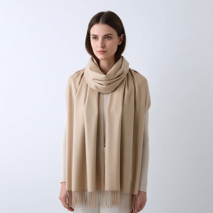 Cozy women's solid winter scarf, chic tassel trim; a versatile and warm fashion wrap.