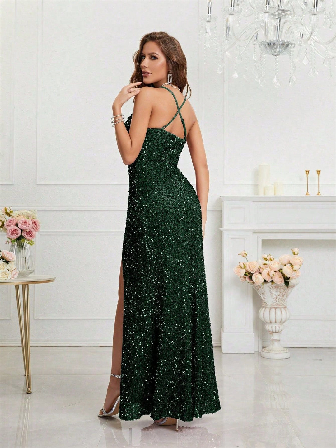 Beautiful sequin formal gown. Full-length, with an alluring V-neck and a chic high slit.