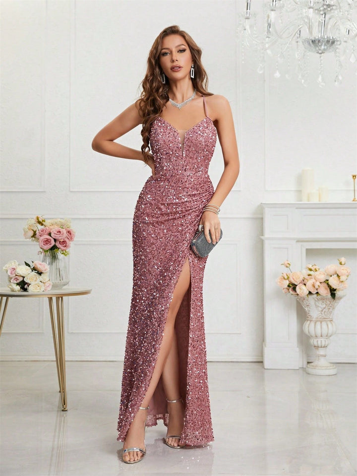 Glam sequin maxi dress. Women's V-neck gown with a high slit, ideal for red carpet events.