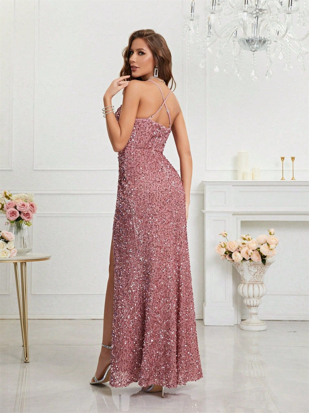 Sparkling sequin evening maxi. Plunge V-neck dress with a high leg slit for a glamorous look.
