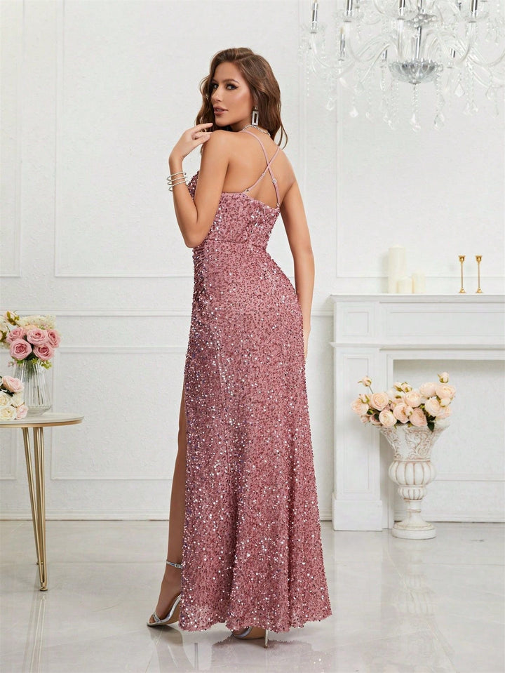 Sparkling sequin evening maxi. Plunge V-neck dress with a high leg slit for a glamorous look.