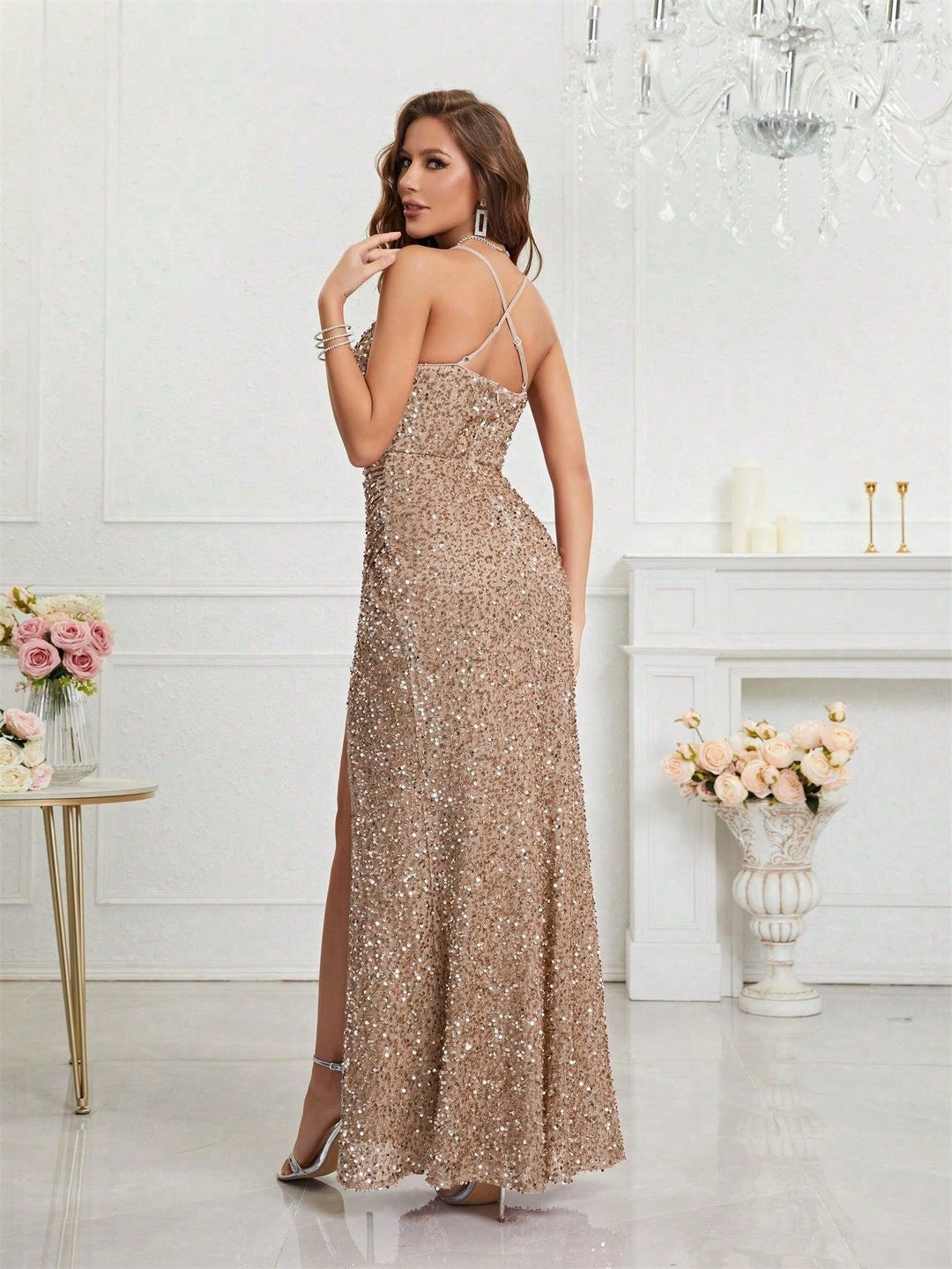 Stunning sequin maxi dress. Plunge V-neck and elegant leg slit, perfect for evening wear.