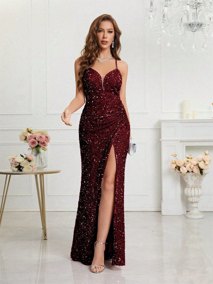 Dazzling women's sequin maxi. Elegant V-neck and leg slit, perfect for any special occasion.