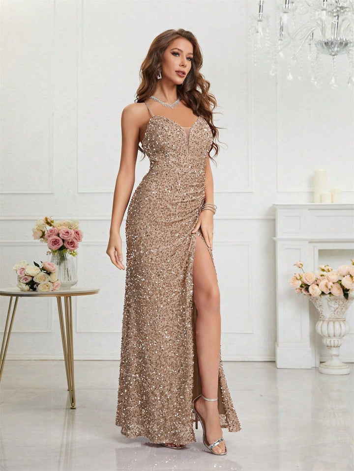 Sparkling sequin evening dress. Full-length gown with a sexy plunge V-neck and leg slit design.