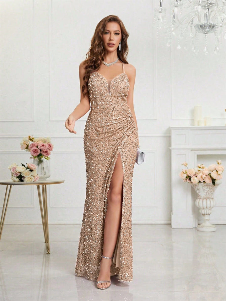 Elegant women's sequin dress. Maxi silhouette, flattering V-neck, and chic high leg slit.