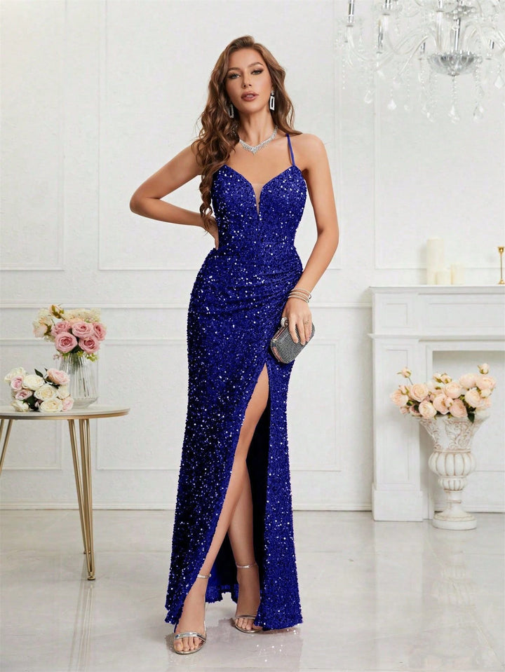 Women's formal sequin maxi. Features a striking plunge V-neck and an alluring high slit.