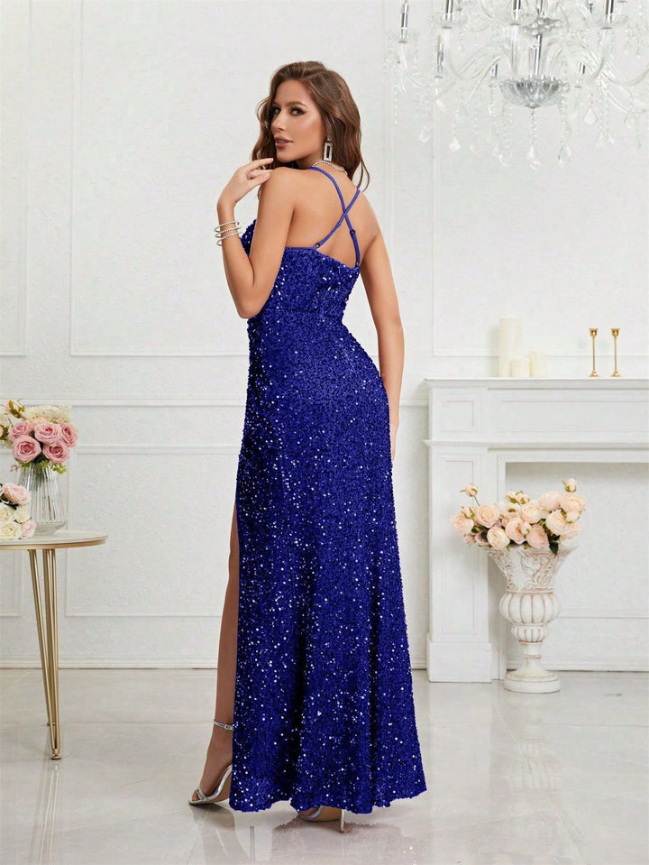 Luxurious sequin evening gown. Maxi cut, sophisticated V-neck, and a captivating leg slit.