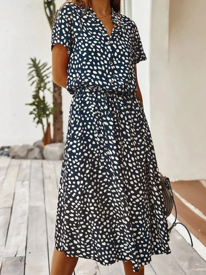 Stylish women's spot print midi shirt dress, collared, comfortable & elegant for any occasion.