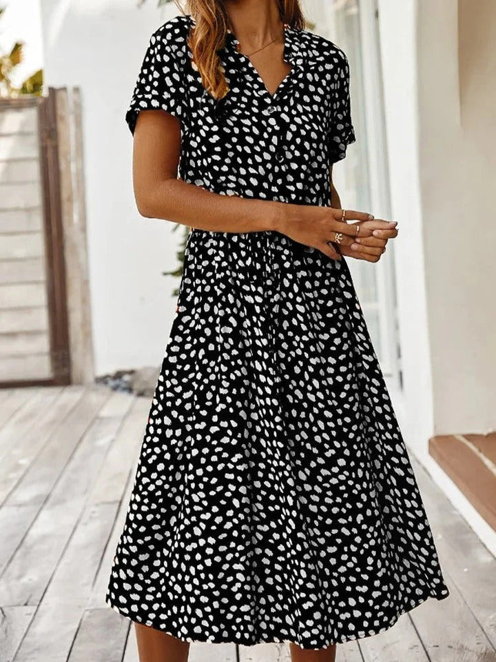 Flattering gathered waist women's midi shirt dress with a charming spot print & collared neck.