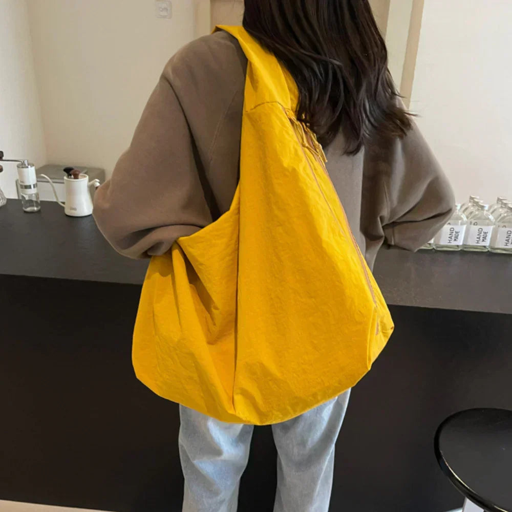 Yellow large slouchy shoulder bag, a versatile everyday handbag for women.