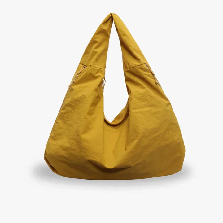 Black slouchy hobo shoulder bag, a large capacity handbag for women's daily needs.