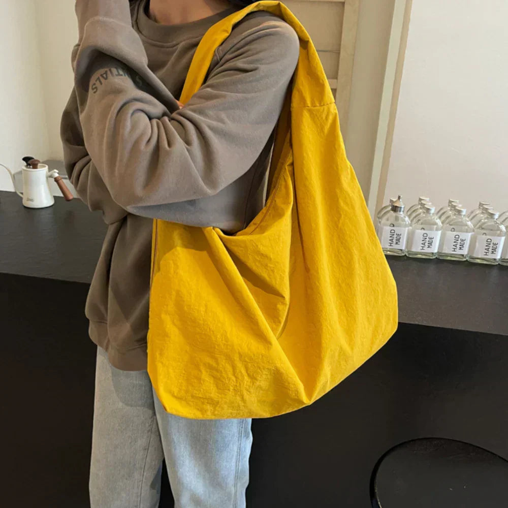 Grey women's hobo bag, comfortable and large, perfect for casual everyday fashion.