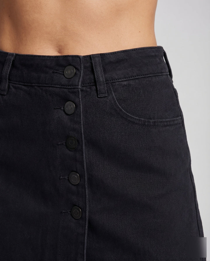 Stylish women's skort, asymmetric cut, functional button front & trendy raw hem. Ideal summer bottom.
