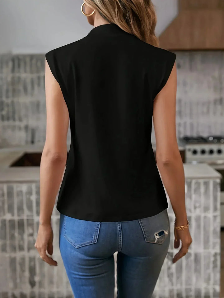 Comfortable and elegant women's high neck sleeveless blouse, great for business and casual occasions.