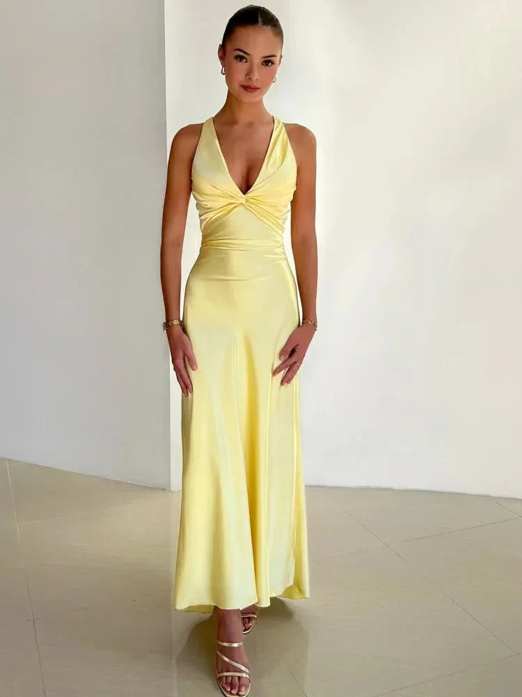 Elegant women's bow back maxi cocktail dress. Sleeveless formal party wear for special occasions.