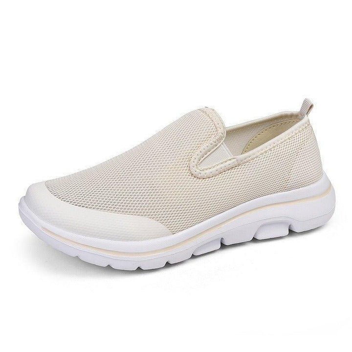 Premium women's wide toe slip-on sneakers, cushioned for all-day comfort & style.
