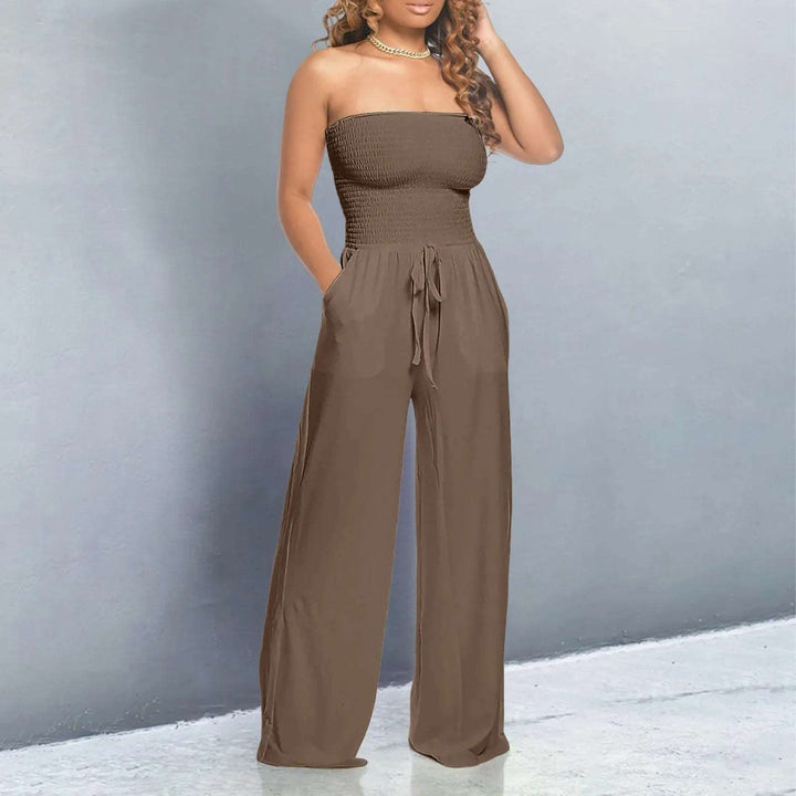 Versatile women's strapless jumpsuit, wide-leg design, tie waist, and pockets, perfect for casual to elegant wear.