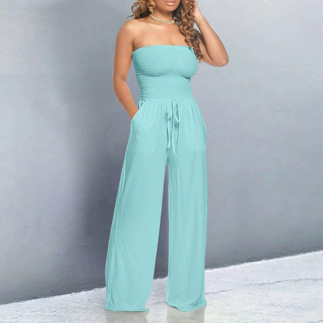 Fashionable women's sleeveless strapless wide-leg jumpsuit, complete with an adjustable tie waist and useful pockets.