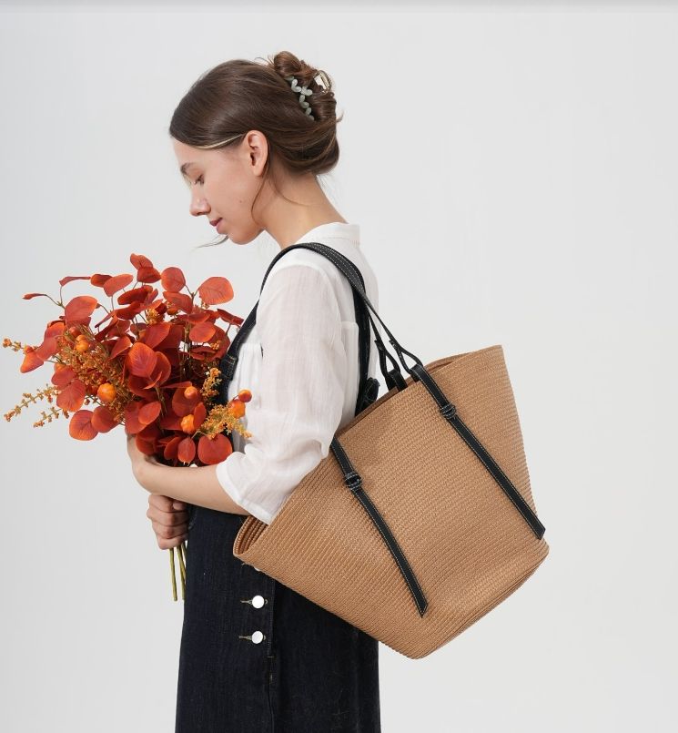 Stylish khaki woven tote bag for women, ideal as a beach bag or versatile everyday shopper.