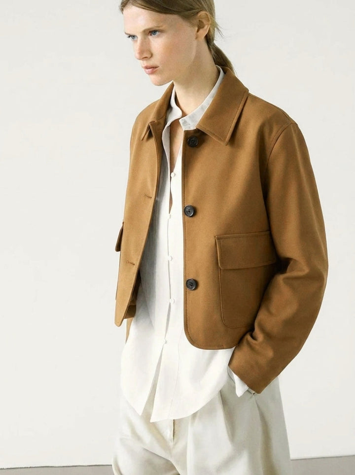 Fashionable women's cropped suede jacket. A chic button-up, perfect for versatile everyday styling & cool weather.