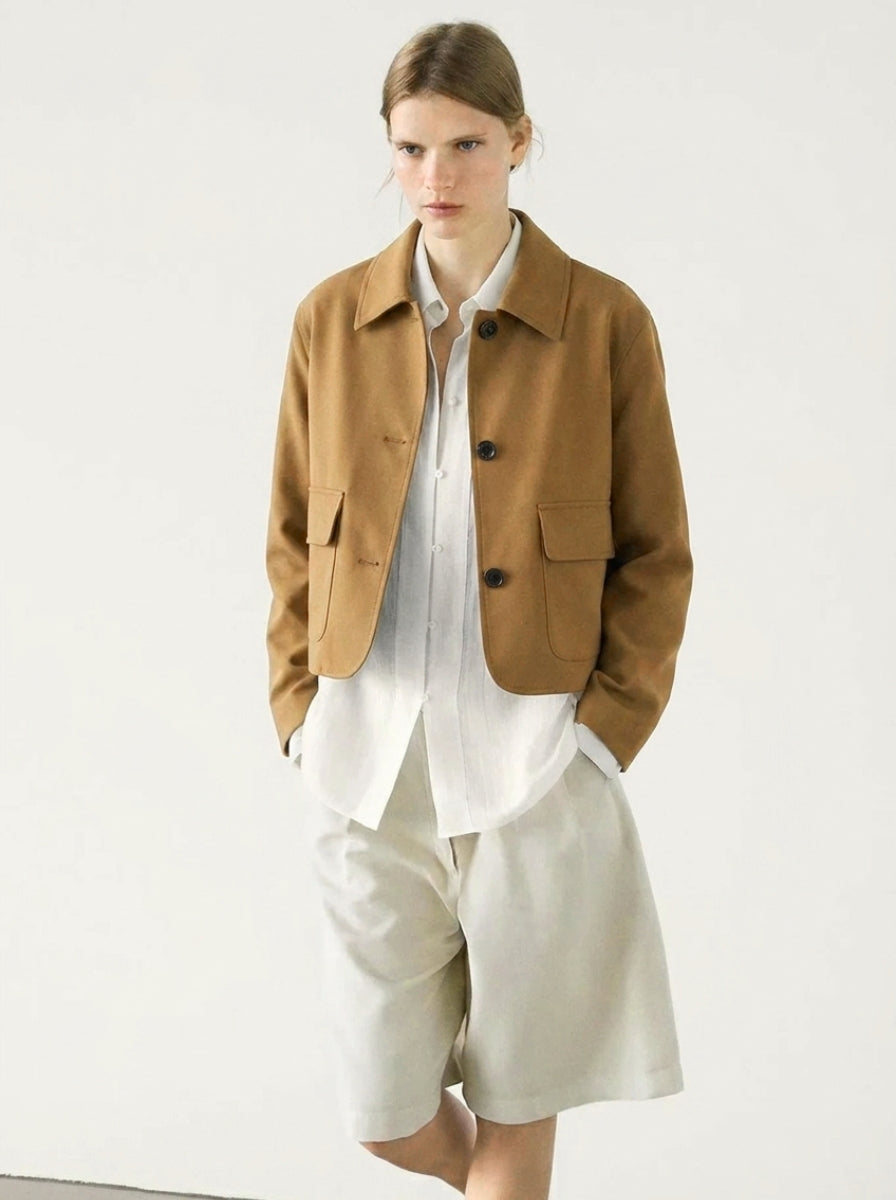 Casual women's cropped suede jacket with a button-up front & patch pockets. A versatile piece for everyday autumn/spring style.
