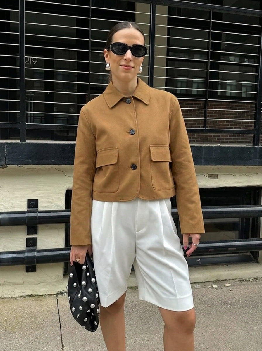 Women's cropped suede jacket with stylish button-up front & practical patch pockets for chic autumn/spring outerwear.