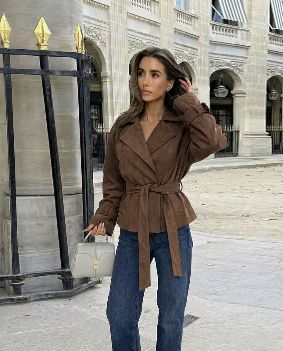 Women's retro suede jacket with a belted waist and notched lapel, perfect for chic fall outerwear.