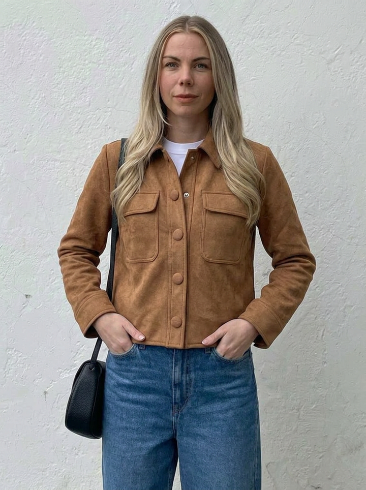 Comfortable women's cropped suede jacket in brown, designed with a button-front for chic, casual layering.