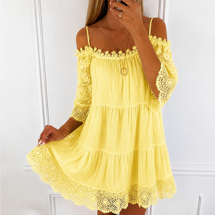 Women's cold shoulder tiered mini dress. Perfect casual summer style, ideal for vacation or beach day.