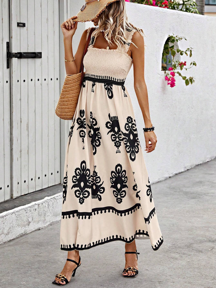 Vacation Smocked Boho Maxi Dress. Women's flowy summer outfit featuring an intricate medallion print. Sleeveless.