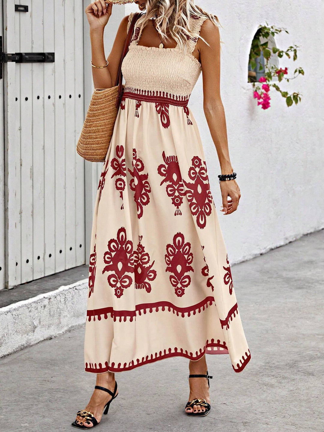 Elegant Casual Smocked Boho Maxi Dress. Perfect for summer vacations, this women's sleeveless medallion print dress.