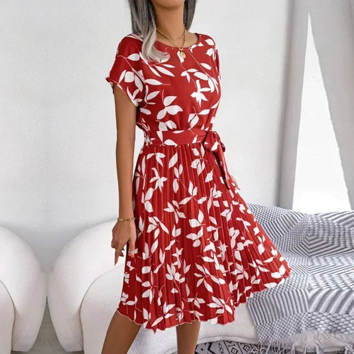 Elegant floral midi summer dress for women, featuring a tie waist, suitable for casual days or vacation.
