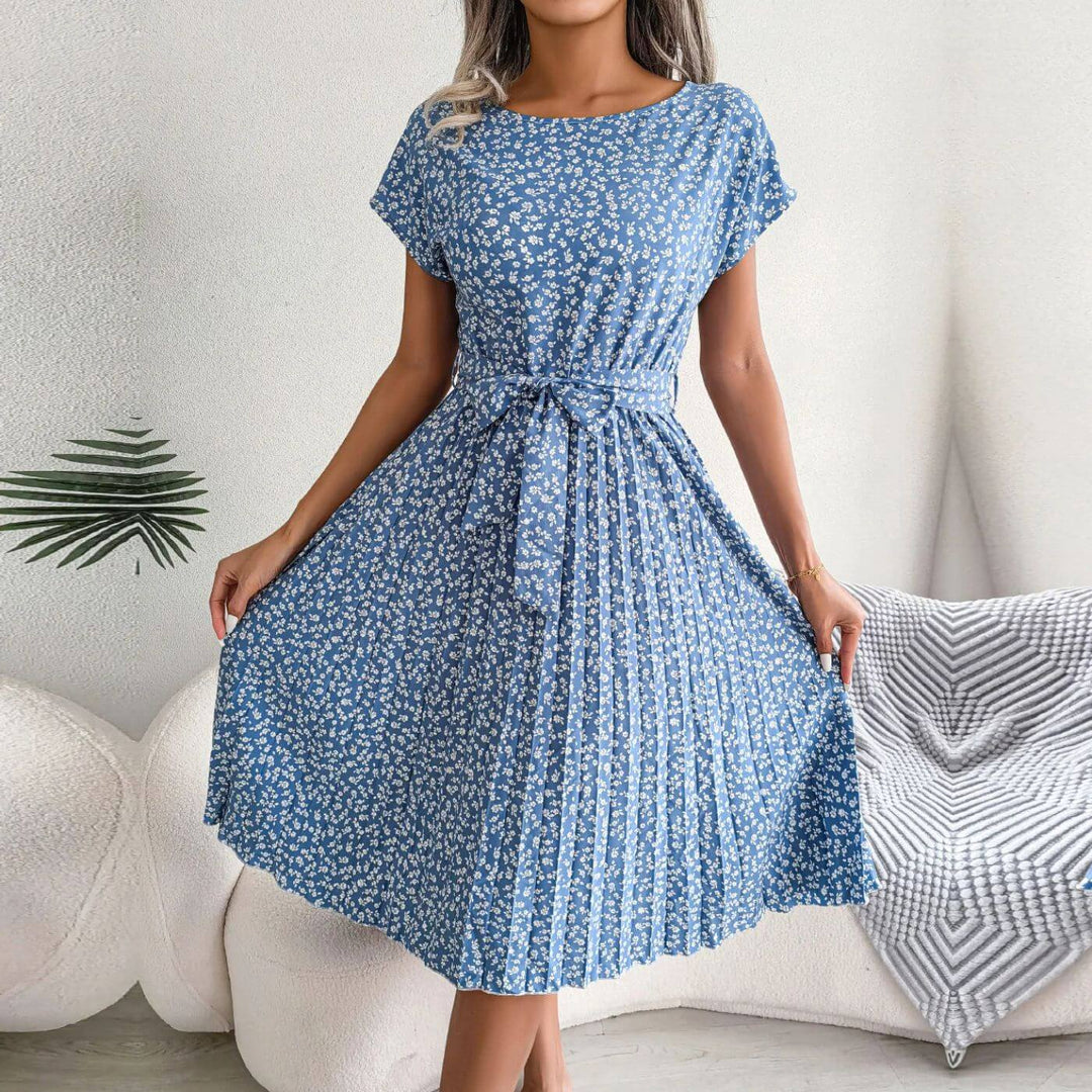 Elegant women's floral midi summer dress with a stylish tie waist, perfect for day wear or vacation.