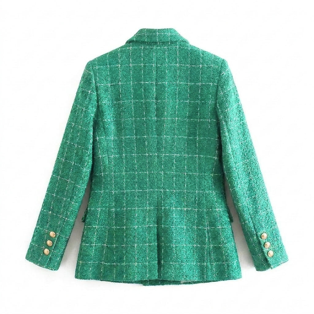 Stylish double-breasted tailored blazer for women, featuring a sharp peak lapel. Ideal for professional attire & formal events.