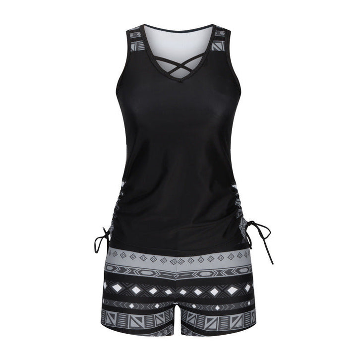 Women's two-piece tankini swimwear featuring a flattering criss-cross top & vibrant patterned shorts.