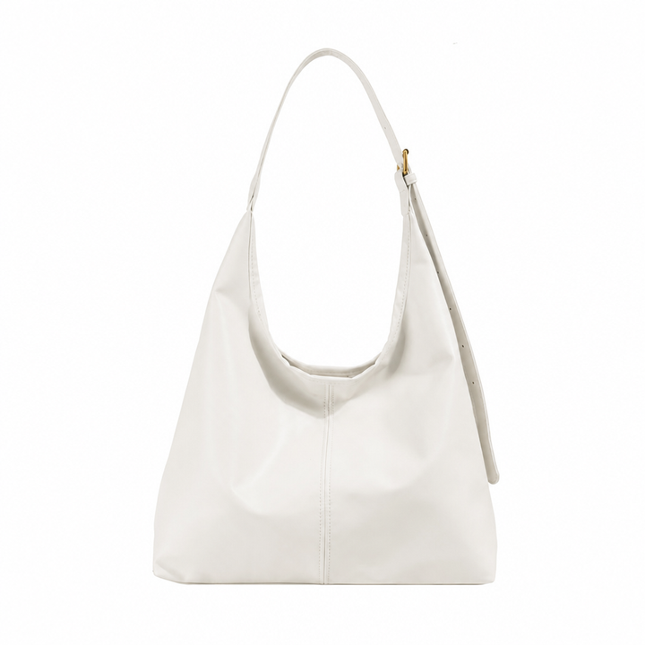Stylish women's large capacity slouchy tote bag, ideal for daily essentials & fashion-forward look.